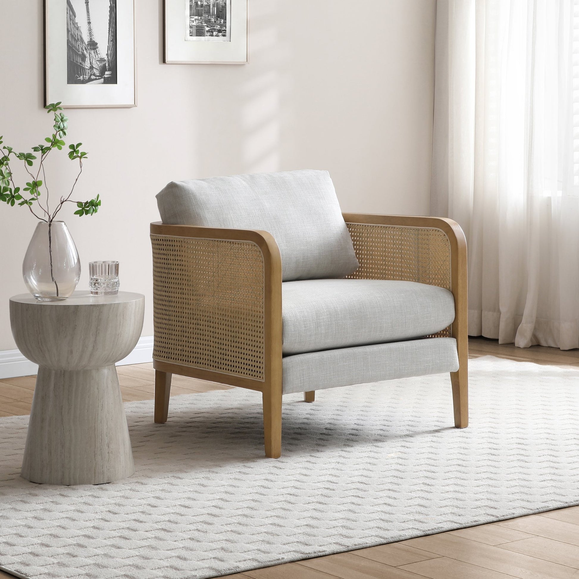 Shop the Mabel Rattan Accent Chair, a unique piece featuring a padded back and seat adorned with a bolster cushion, all resting on a stained wooden frame. Shop online now at www.nobleandnook.co.uk