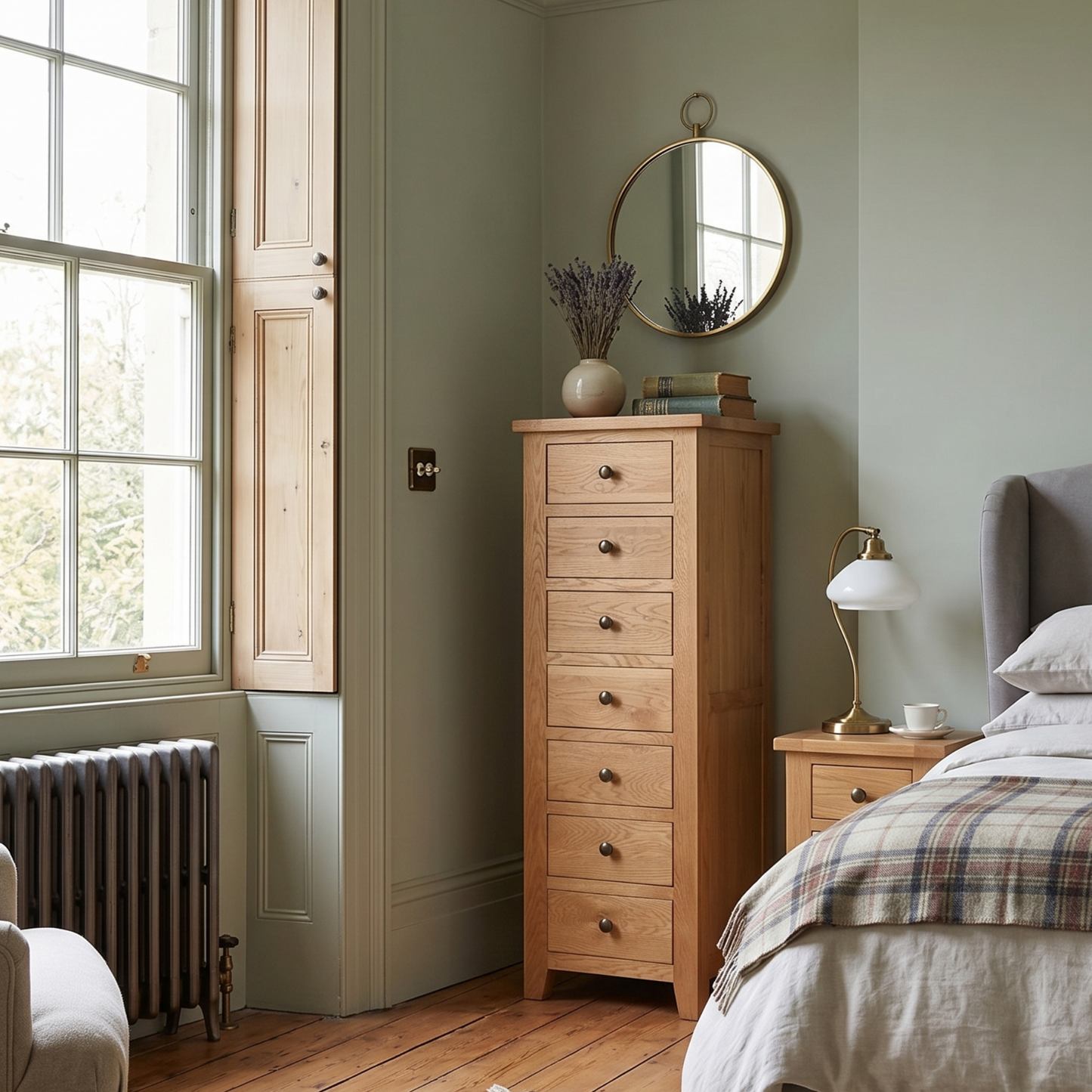 Main bedroom with wooden 7 drawer dresser, and decorative elements.