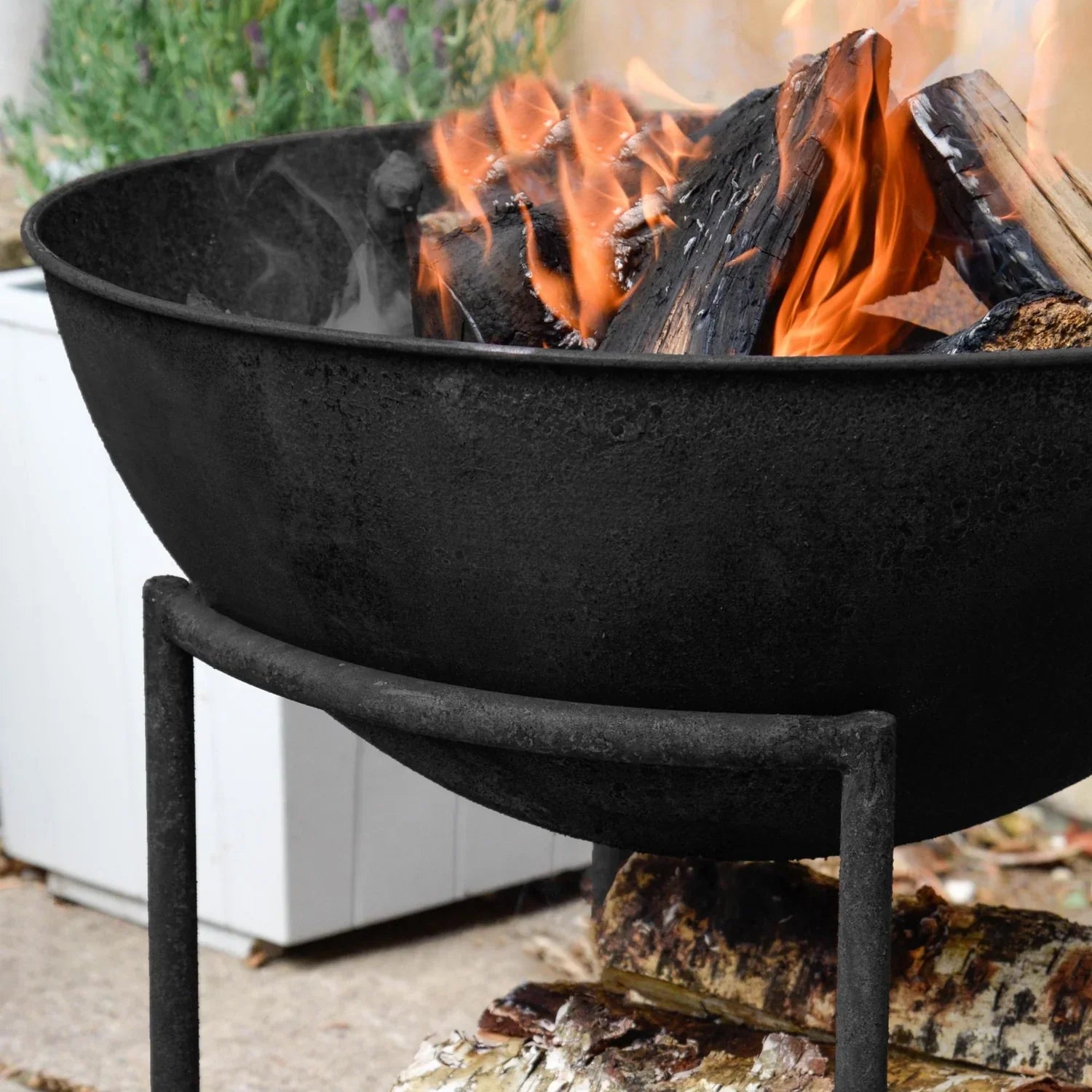 Enhance your outdoor gatherings with this medium-sized cast iron fire bowl with stand, perfect to add warmth and ambiance throughout the night. Shop online today at www.nobleandnook.co.uk