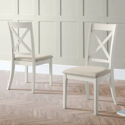 Shop the Provence dining chair, designed to suit both contemporary and traditional homes. Finished in grey lacquer and upholstered in soft ivory fabric. Pair with the Provence dining table for a complete set. Shop online today www.nobleandnook.co.uk