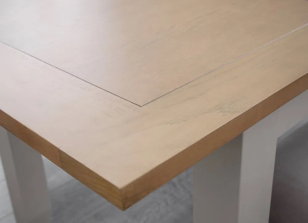 The Richmond Extending Dining Table in Elephant Grey and Pale Oak with a clever built-in extension, this versatile table adjusts to suit your needs—compact for everyday living. Shop online today www.nobleandnook.co.uk