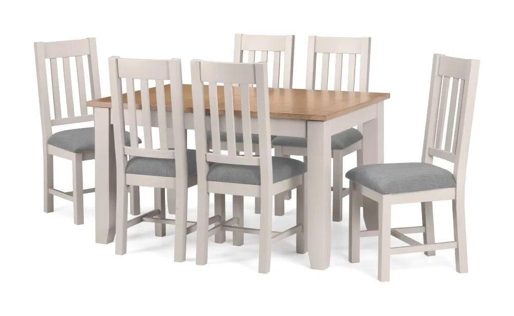 The Richmond Extending Dining Table in Elephant Grey and Pale Oak with a clever built-in extension, this versatile table adjusts to suit your needs—compact for everyday living. Shop online today www.nobleandnook.co.uk