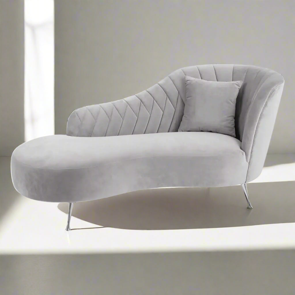 This Grey Velvet Chaise Longue is a sophisticated fusion of modern design and timeless elegance. Ideal for contemporary interiors with a classic touch. Shop online today at www.nobleandnook.co.uk