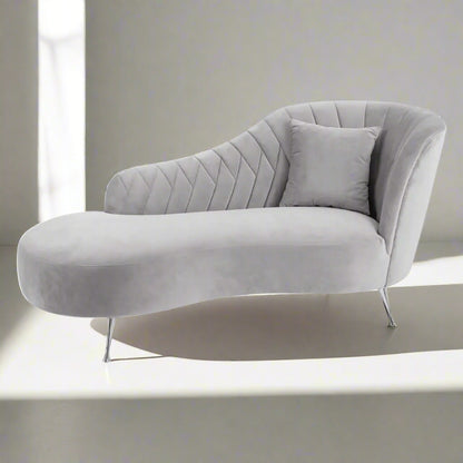 This Grey Velvet Chaise Longue is a sophisticated fusion of modern design and timeless elegance. Ideal for contemporary interiors with a classic touch. Shop online today at www.nobleandnook.co.uk