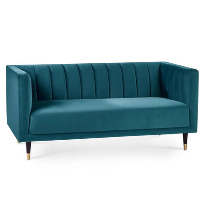 Shop the stylish scalloped sofa in soft teal velvet with fluted back design and brass tip legs. FREE UK MAINLAND DELIVERY. Shop online now at www.nobleandnook.co.uk