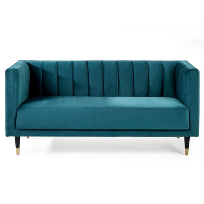 Shop the stylish scalloped sofa in soft teal velvet with fluted back design and brass tip legs. FREE UK MAINLAND DELIVERY. Shop online now at www.nobleandnook.co.uk
