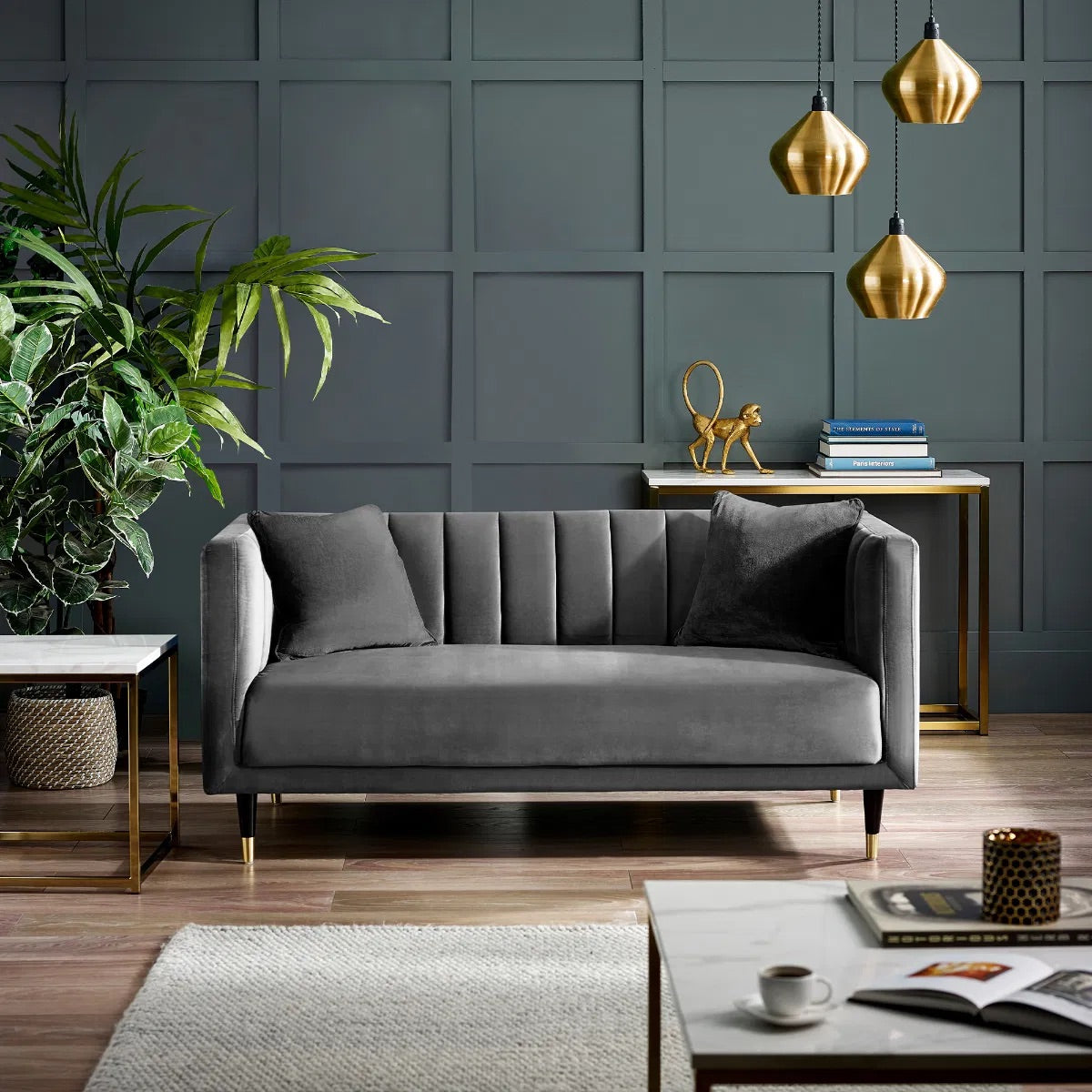 Shop the stylish scalloped sofa in soft teal velvet with fluted back design and brass tip legs. FREE UK MAINLAND DELIVERY. Shop online now at www.nobleandnook.co.uk
