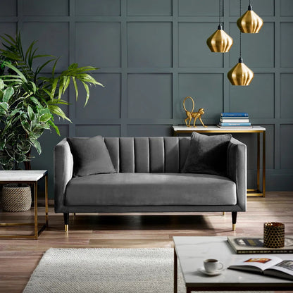 Shop the stylish scalloped sofa in soft teal velvet with fluted back design and brass tip legs. FREE UK MAINLAND DELIVERY. Shop online now at www.nobleandnook.co.uk