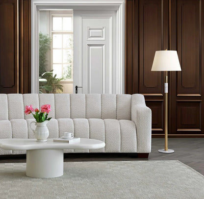 Indulge in luxury with the Aluxo Astoria 3 Seater Sofa in Oatmeal Boucle Fabric. An exquisite piece featuring deep channel stitching and adorned with a soft and alluring boucle fabric in a stunning Oatmeal hue. Shop online today at www.nobleandnook.co.uk