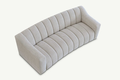 Indulge in luxury with the Aluxo Astoria 3 Seater Sofa in Oatmeal Boucle Fabric. An exquisite piece featuring deep channel stitching and adorned with a soft and alluring boucle fabric in a stunning Oatmeal hue. Shop online today at www.nobleandnook.co.uk