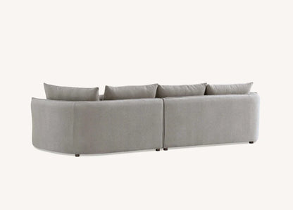 Shop the Aluxo Rubin Corner Chaise in Pebble Boucle, the epitome of luxury and comfort. It's organic curves and contemporary boucle fabric, in a range of neutral tones, make it a statement piece in any home. Shop online today at www.nobleandnook.co.uk