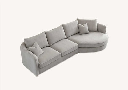 Shop the Aluxo Rubin Corner Chaise in Pebble Boucle, the epitome of luxury and comfort. It's organic curves and contemporary boucle fabric, in a range of neutral tones, make it a statement piece in any home. Shop online today at www.nobleandnook.co.uk