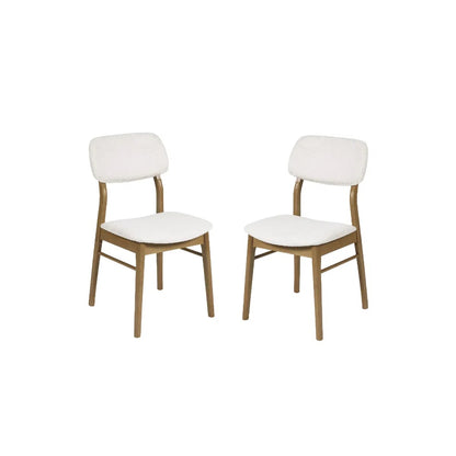 Dimensions: H85 x W56 x D45 cm. Luxurious White Boucle Upholstery adds a rich, tactile finish that feels both inviting and sophisticated. Ergonomically designed for lasting comfort and support during long meals and conversations. 