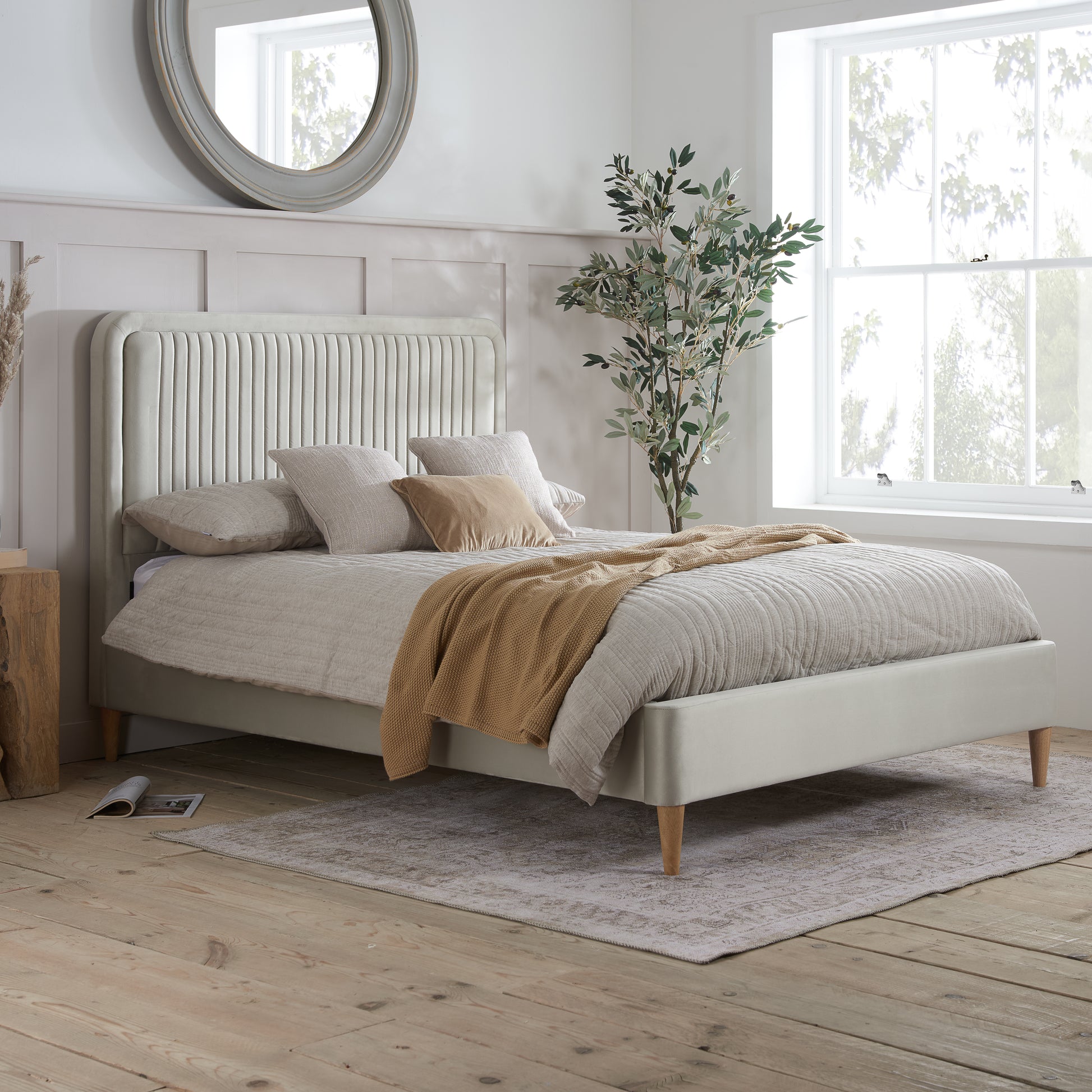 Experience luxury and comfort with this beautifully crafted king size bed frame, upholstered in warm stone grey fabric. Designed to blend timeless elegance. Shop online today at www.nobleandnook.co.uk