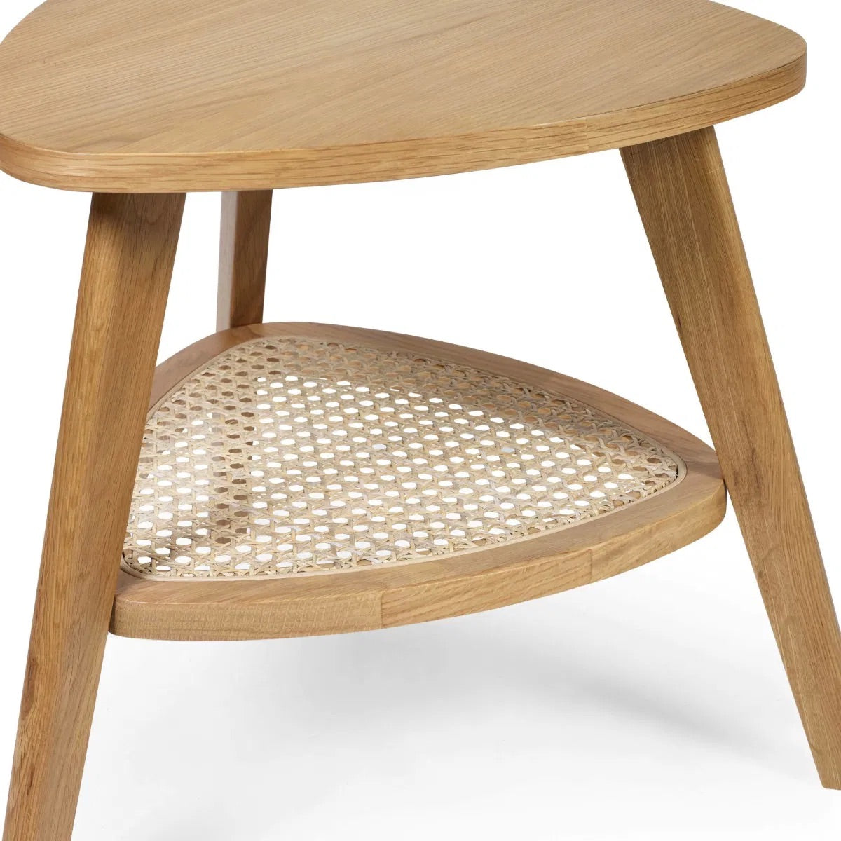The Vera Side three-legged Table, featuring a rattan-inspired shelf and a warm natural wood finish.  Perfect for smaller spaces. Available at www.nobleandnook.co.uk