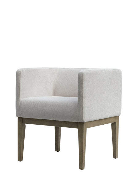 Indulge in the luxurious comfort of the Wolford Dining Chair, crafted from soft chenille fabric in a sophisticated clay colour. FREE UK Mainland Delivery. Shop online today at www.nobleandnook.co.uk