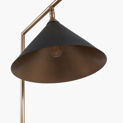 The Zeta Floor Lamp, featuring a sleek combination of matte black and antique brass metal. FREE UK MAINLAND DELIVERY. Shop online now at www.nobleandnook.co.uk