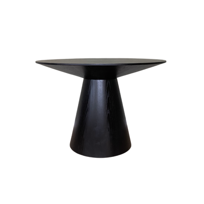 Shop the stunning Lotus Dining Table. Expertly crafted, this table is both functional and stylish with its column base and circular top. Shop online today at www.nobleandnook.co.uk