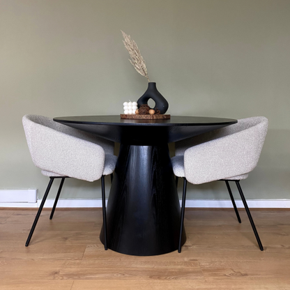 Shop the stunning Lotus Dining Table. Expertly crafted, this table is both functional and stylish with its column base and circular top. Shop online today at www.nobleandnook.co.uk