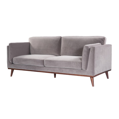 Shop the Mickey 3 Seat Sofa in a fashionable grey velvet hue with tapered walnut legs. This is a contemporary masterpiece. Shop online today at www.nobleandnook.co.uk