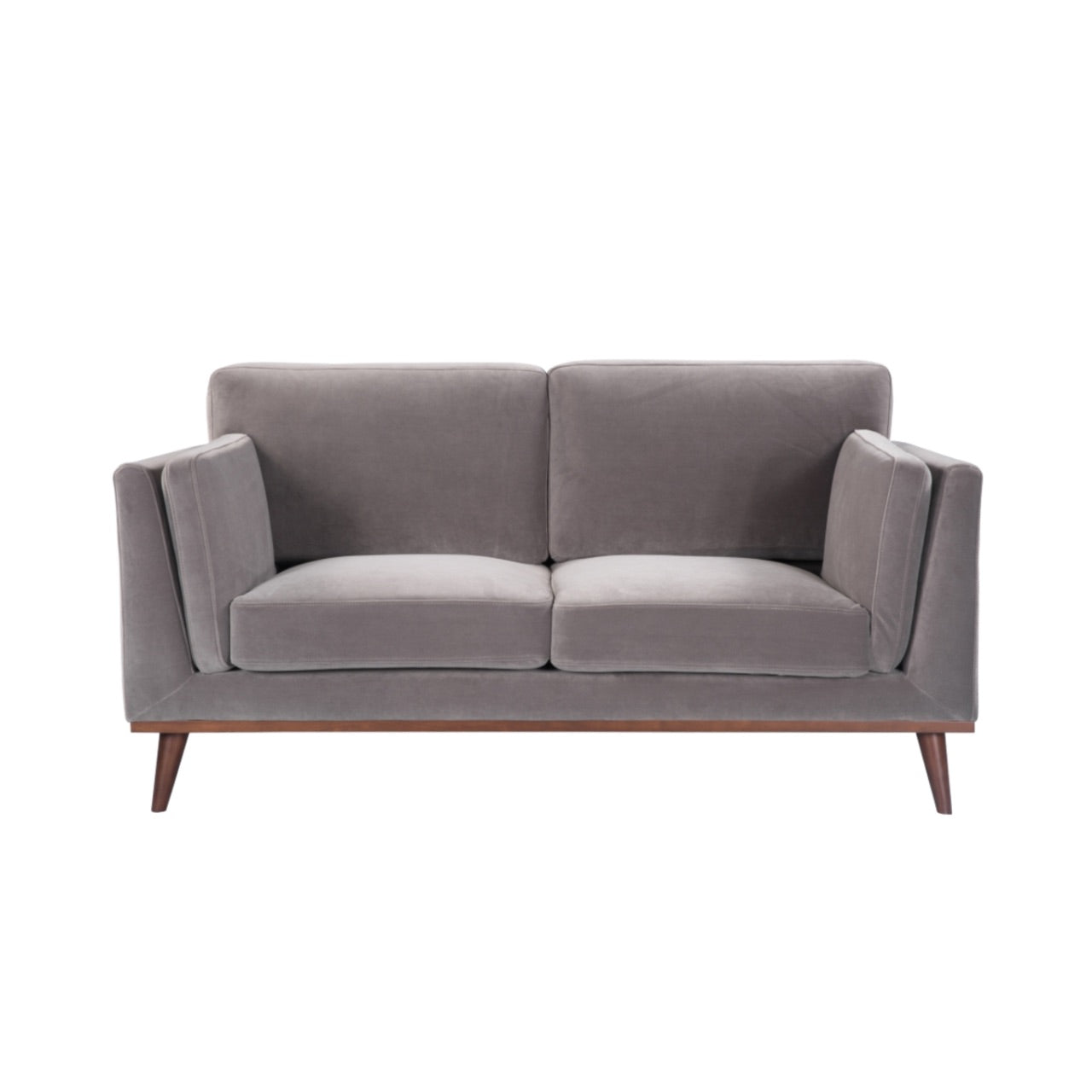 Shop the Mickey 2 seater sofa in Stone Grey velvet with a walnut frame and tapered walnut legs, a contemporary masterpiece. Shop online today at www.nobleandnook.co.uk
