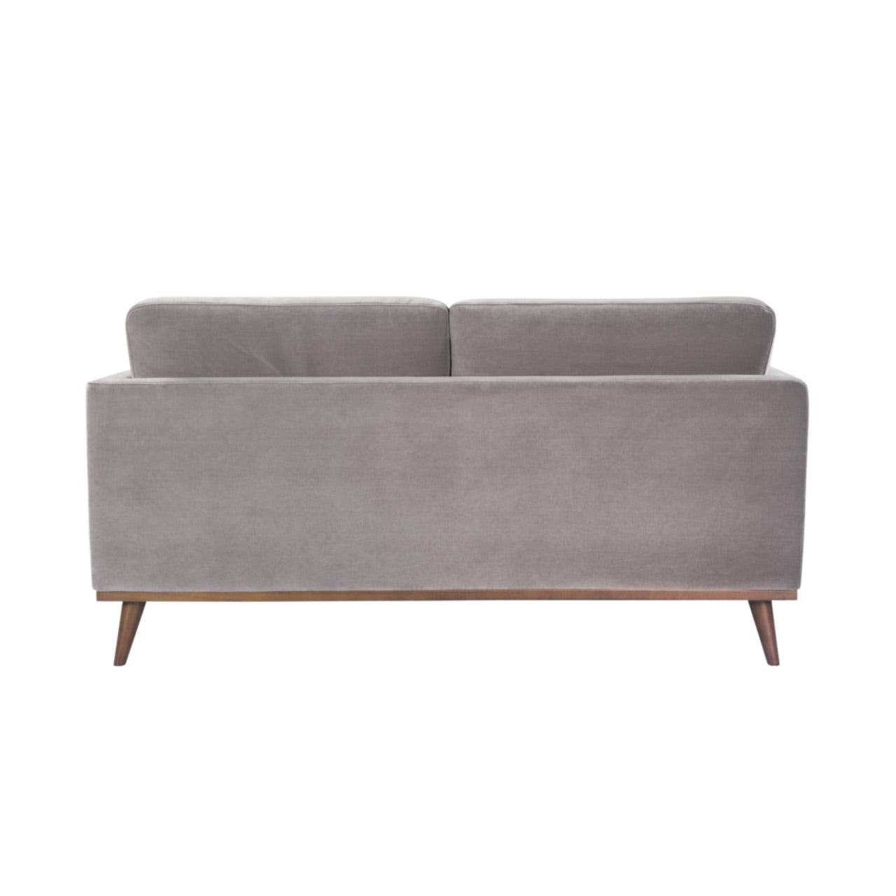 Shop the Mickey 2 seater sofa in Stone Grey velvet with a walnut frame and tapered walnut legs, a contemporary masterpiece. Shop online today at www.nobleandnook.co.uk