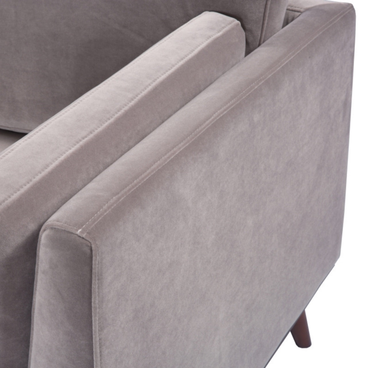 Shop the Mickey 2 seater sofa in Stone Grey velvet with a walnut frame and tapered walnut legs, a contemporary masterpiece. Shop online today at www.nobleandnook.co.uk