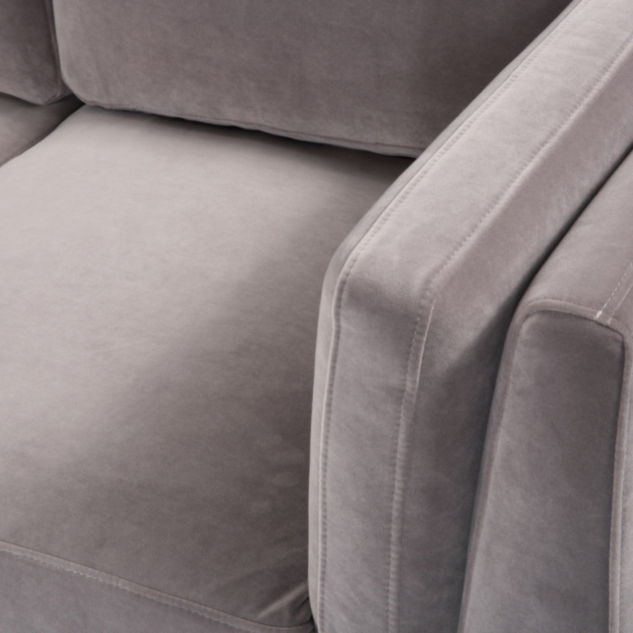 Shop the Mickey 2 seater sofa in Stone Grey velvet with a walnut frame and tapered walnut legs, a contemporary masterpiece. Shop online today at www.nobleandnook.co.uk