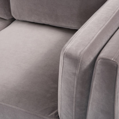 Shop the Mickey 2 seater sofa in Stone Grey velvet with a walnut frame and tapered walnut legs, a contemporary masterpiece. Shop online today at www.nobleandnook.co.uk