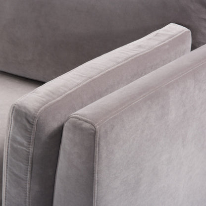 Shop the Mickey 3 Seat Sofa in a fashionable grey velvet hue with tapered walnut legs. This is a contemporary masterpiece. Shop online today at www.nobleandnook.co.uk